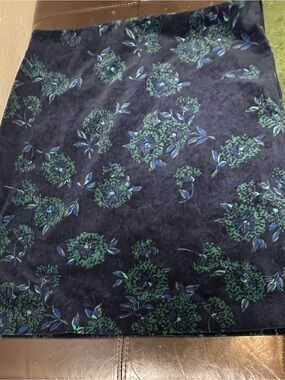 Ann Taylor Navy Mini Skirt with Green Floral Pattern. Size 8.